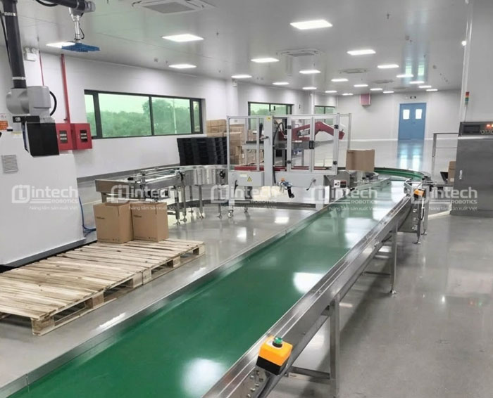 Lợi ích khi cho hệ thống băng tải thông minh & máy dán thùng tự động & Trạm robot đi vào vận hành